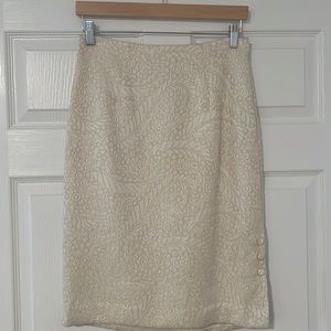 Dressy white and gold skirt in new condition